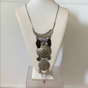 Pendant charm necklace and semi precious stones.